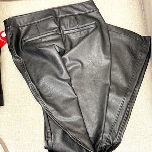 Black leather like SPANX flare pants. Brand New with tags!